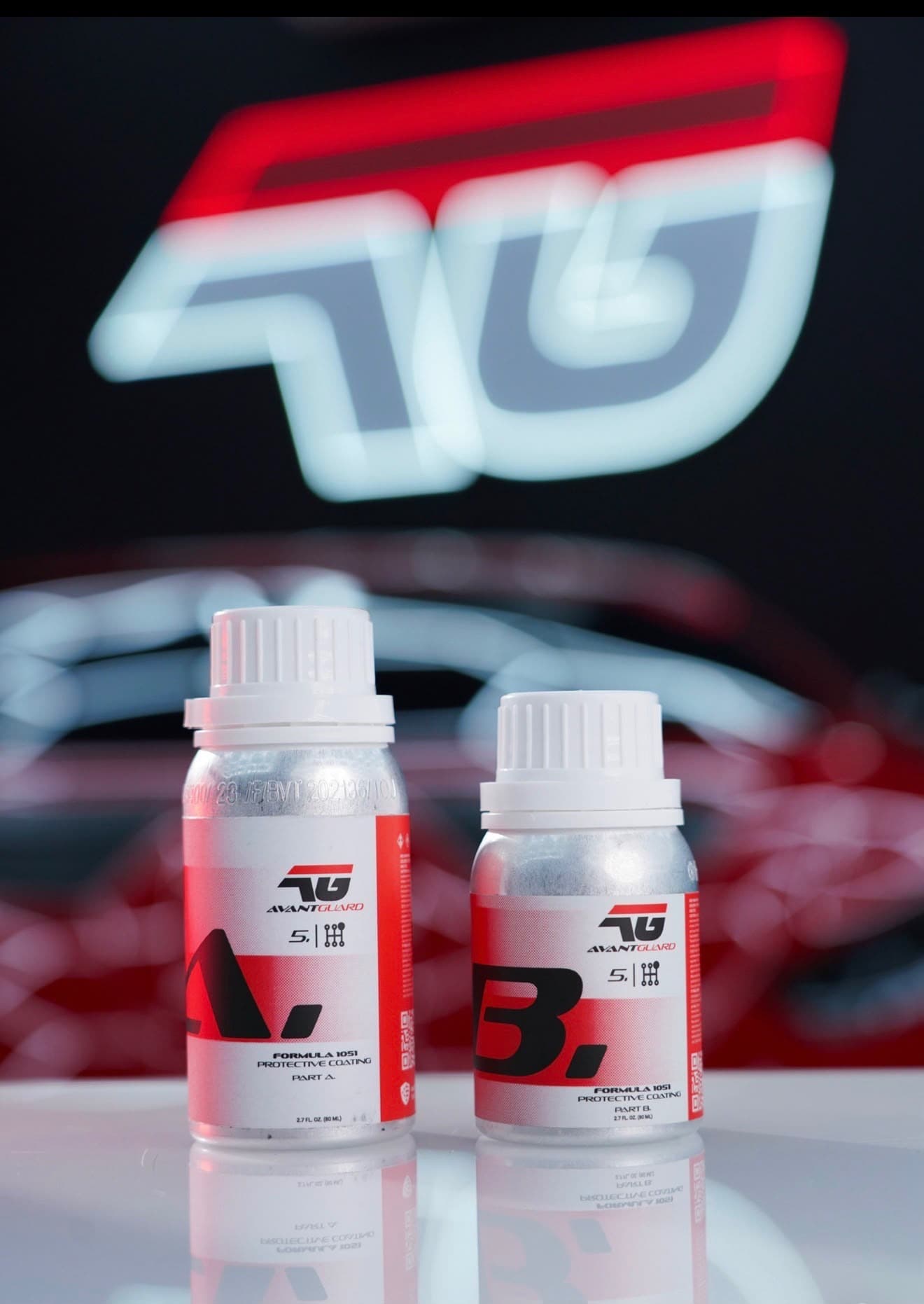 Formula 1051 Part A and Part B bottles on a mirrored surface with the AvantGuard logo behind